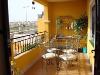 Dining Suite on a Sunny Balcony